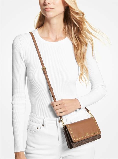 michael michael kors jet set studded leather crossbody bag|michael kors jet set item.